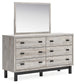 Vessalli King Panel Bed with Mirrored Dresser, Chest and 2 Nightstands