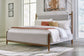 Lyncott King Upholstered Bed with Mirrored Dresser and Nightstand