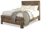 Trinell Queen Panel Bed with Dresser, Chest and Nightstand